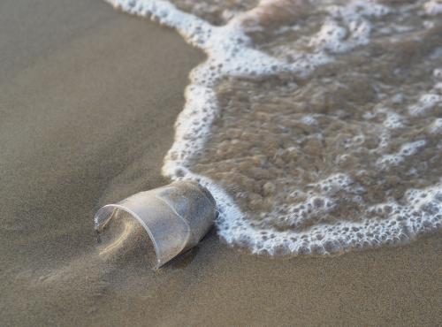 Plastic cup in the ocean