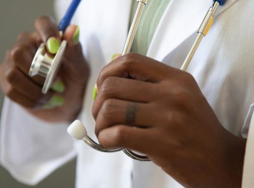 doctor holding stetoscope