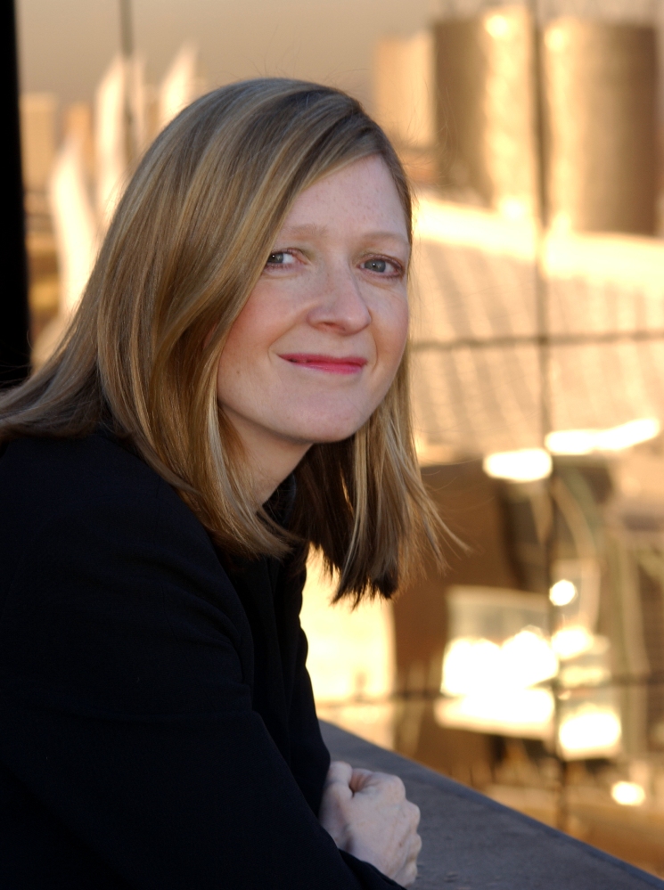 Dr. Julie Madigan, MBE